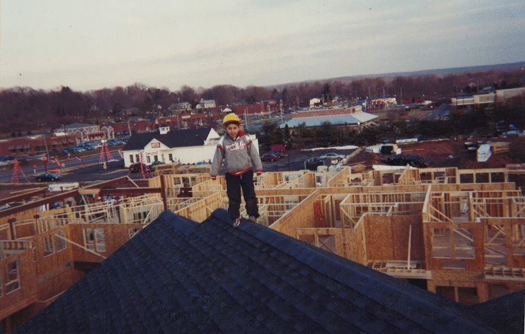 david lema as a kid on a roof